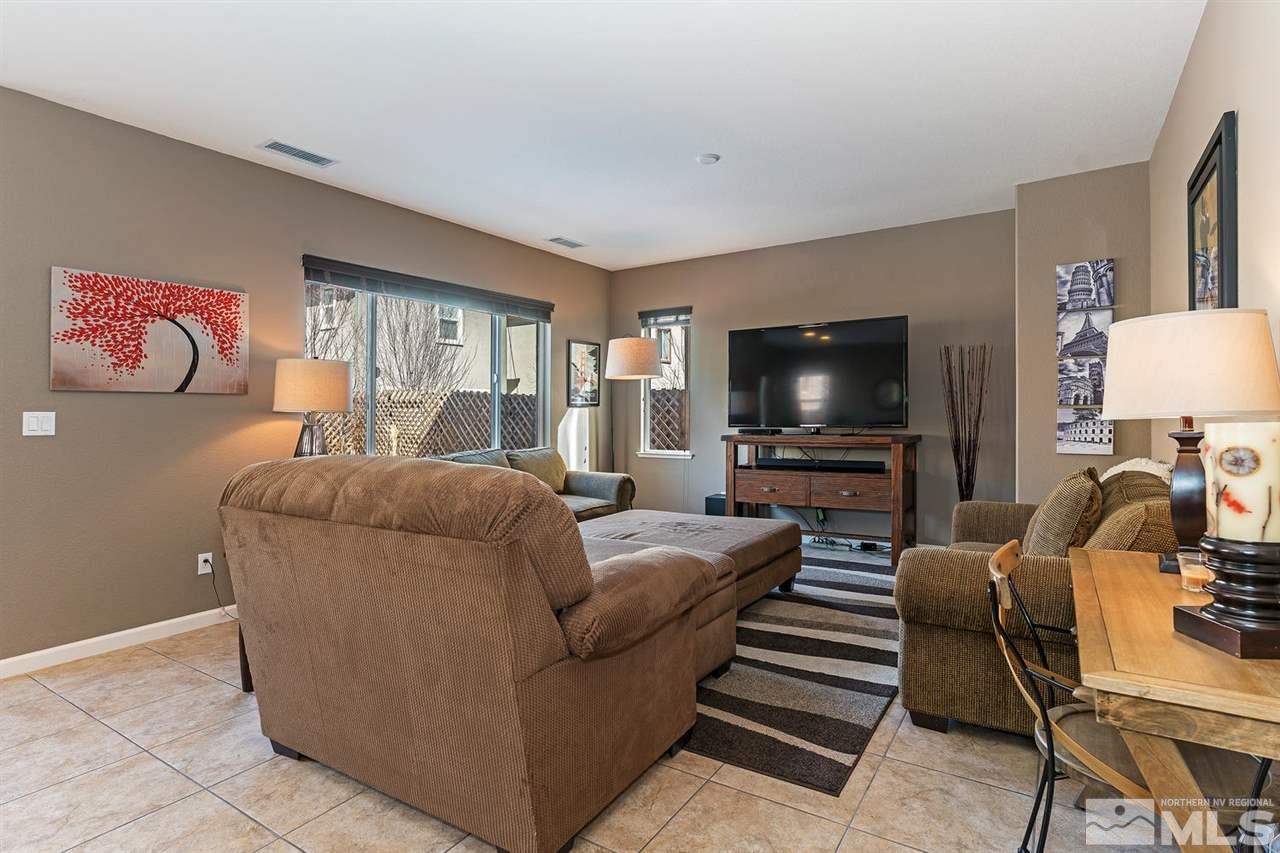1965 Hope Valley Drive Reno, NV 89521 - Photo 3 of 17 a living room with furniture and a flat screen tv