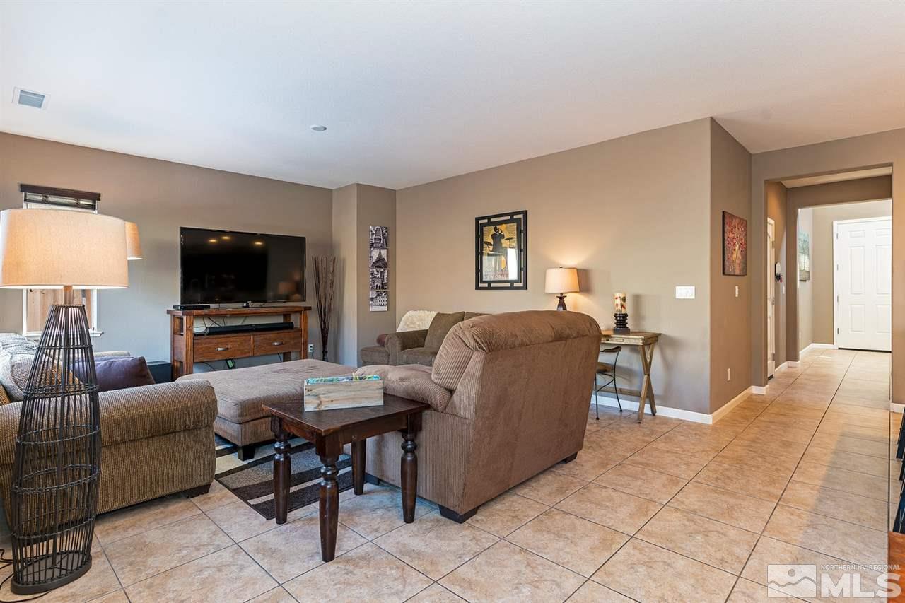 1965 Hope Valley Drive Reno, NV 89521 - Photo 4 of 17 a living room with furniture and a flat screen tv
