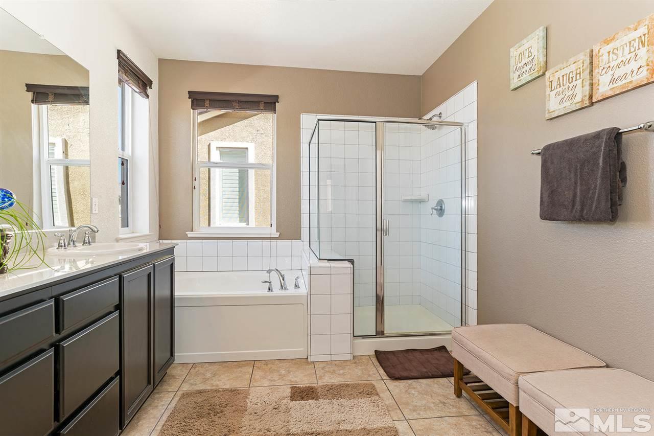 1965 Hope Valley Drive Reno, NV 89521 - Photo 10 of 17 a bathroom with a sink a toilet and shower
