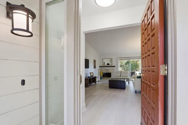 a kitchen with lots of counter top space and stainless steel appliances