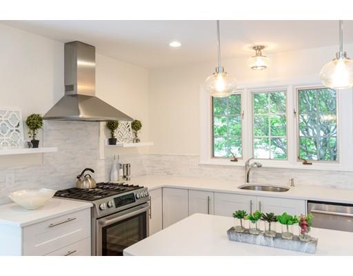 110 Albion Road Wellesley, MA 02481 - Photo 12 of 17 a kitchen with a stove a sink and a window
