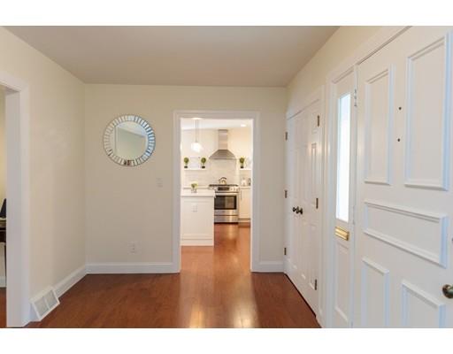 110 Albion Road Wellesley, MA 02481 - Photo 9 of 17 a open hall with wooden floor