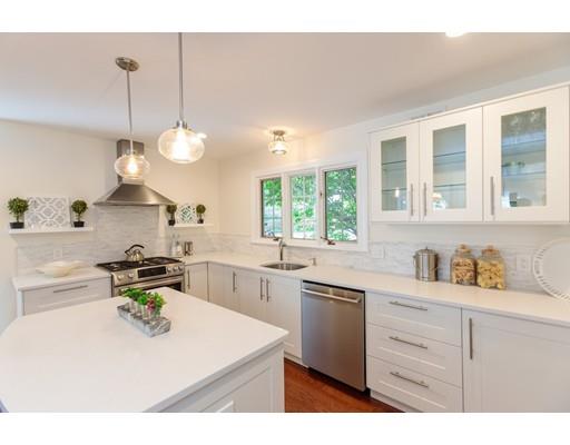 110 Albion Road Wellesley, MA 02481 - Photo 10 of 17 a kitchen with a sink a stove cabinets and counter space
