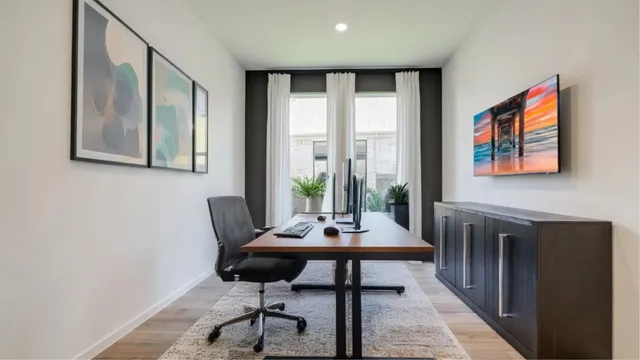 a workspace with furniture and window