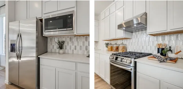 a kitchen with stainless steel appliances granite countertop a stove a refrigerator and a sink