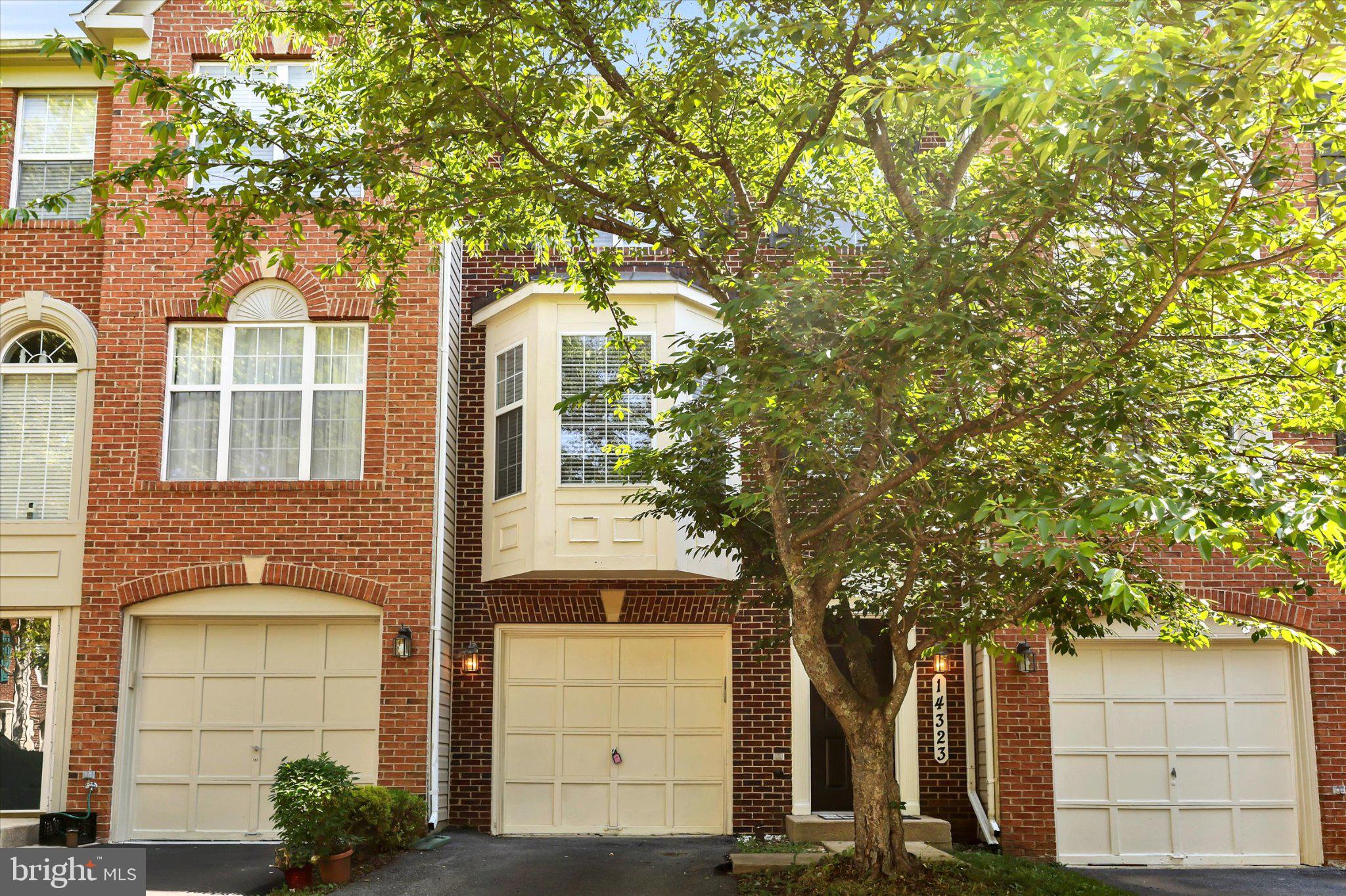 14323 Gate Dancer Lane Boyds, MD 20841 - Photo 2 of 54 Charming brick townhouse with greenery.