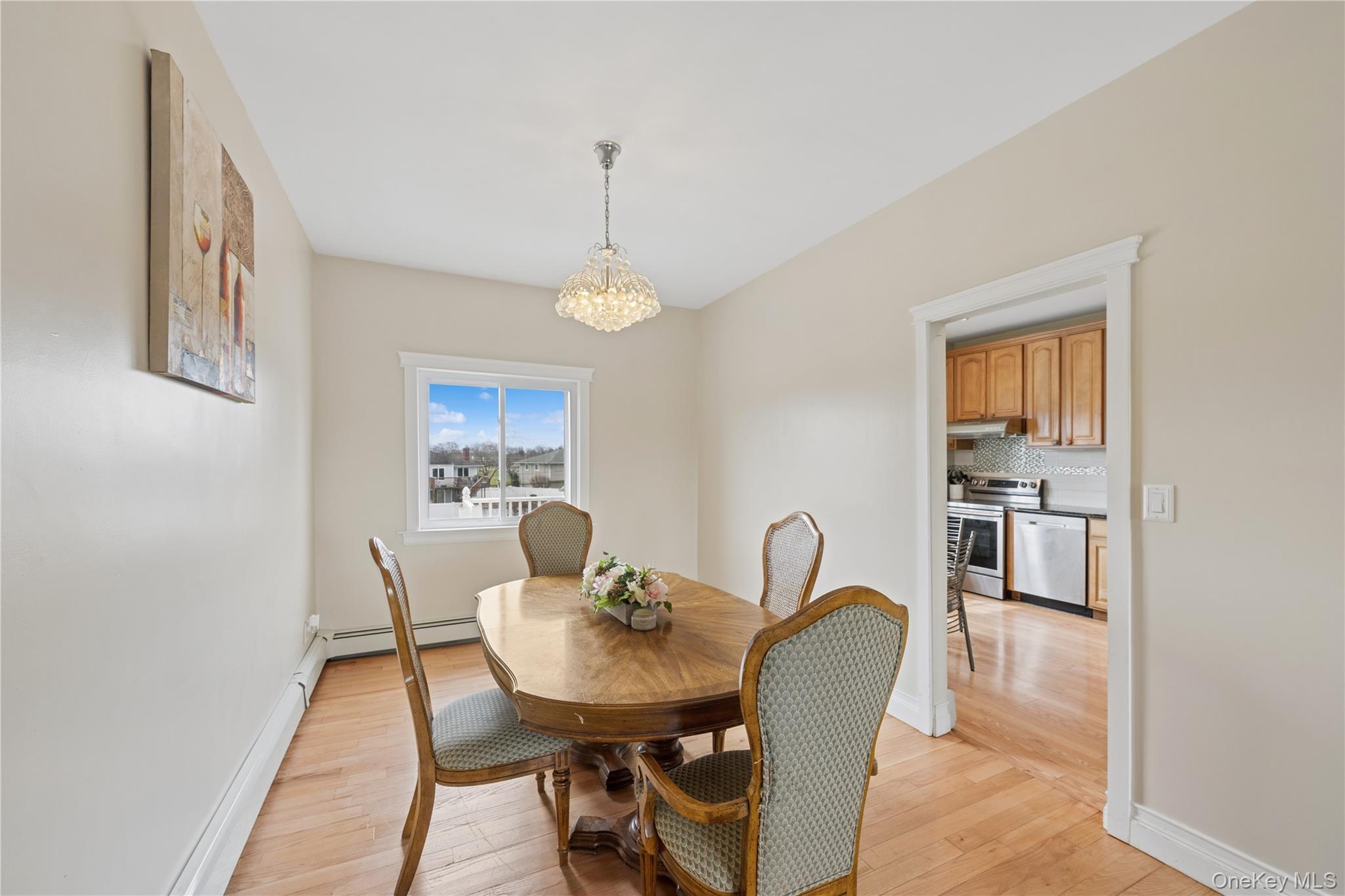 40 Scholar Lane Commack, NY 11725 - Photo 11 of 49 a view of a dining room with furniture and window