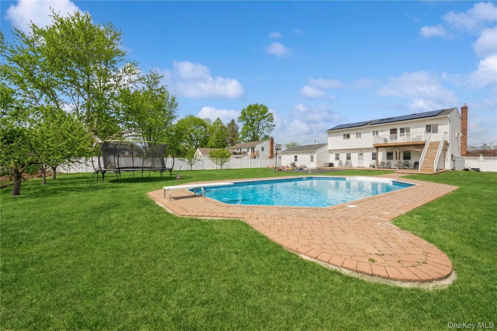 40 Scholar Lane Commack, NY 11725 - Photo 43 of 49 a view of a house with a big yard