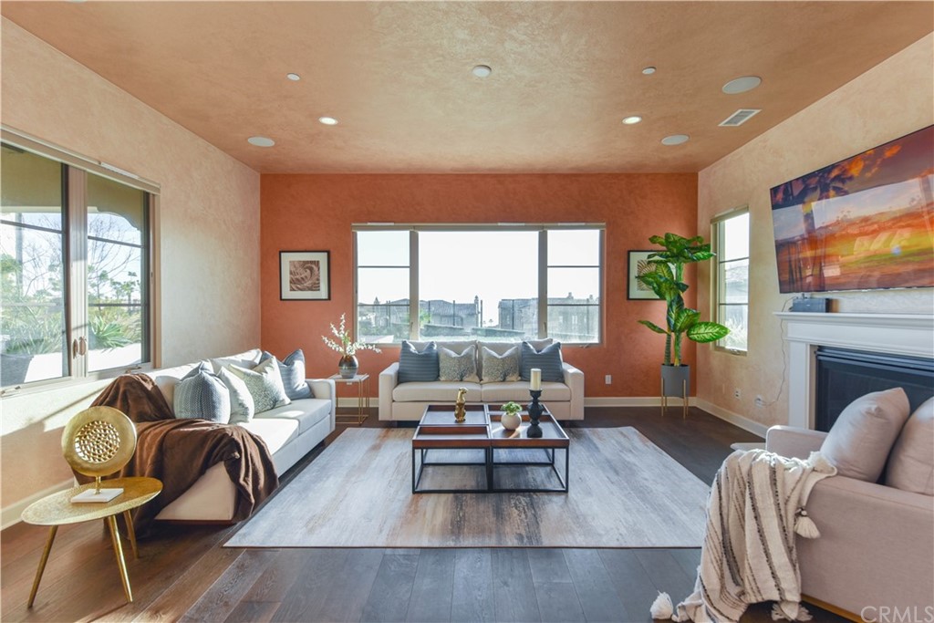323 Via Pamplona San Clemente, CA 92672 - Photo 11 of 74 a living room with furniture and a flat screen tv