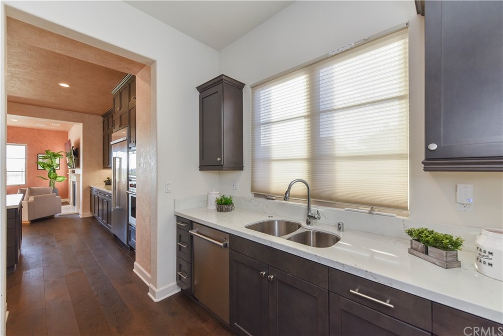 323 Via Pamplona San Clemente, CA 92672 - Photo 16 of 74 a kitchen with a sink and a window
