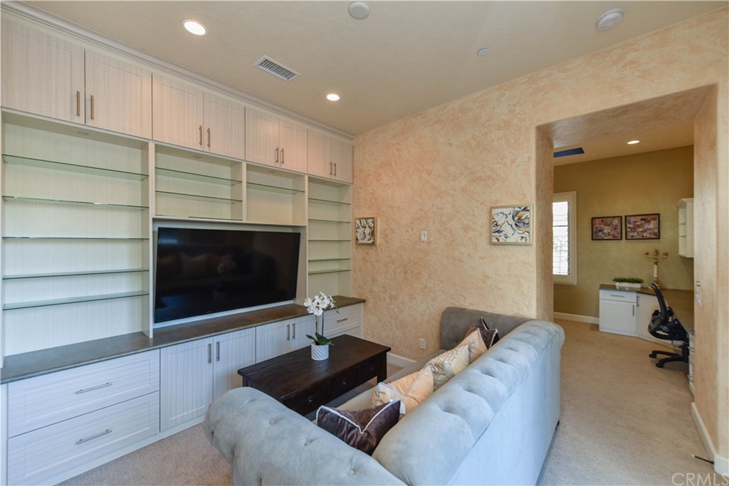 323 Via Pamplona San Clemente, CA 92672 - Photo 20 of 74 a living room with furniture and a flat screen tv