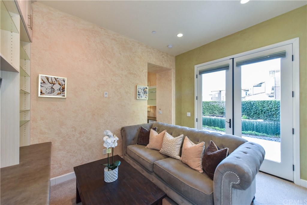 323 Via Pamplona San Clemente, CA 92672 - Photo 21 of 74 a living room with furniture and a floor to ceiling window