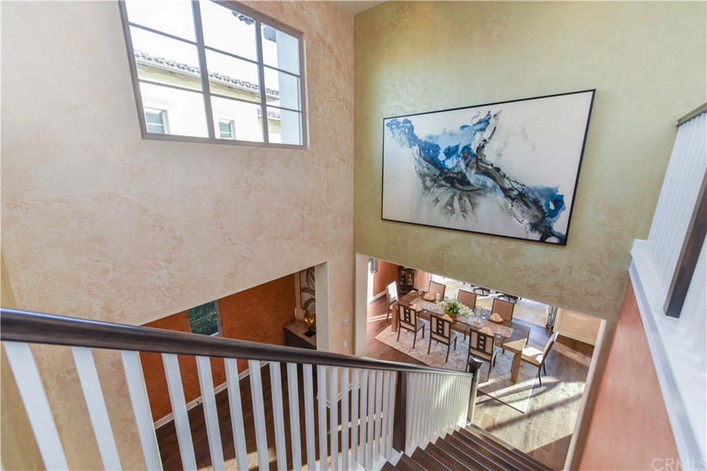 323 Via Pamplona San Clemente, CA 92672 - Photo 26 of 74 a view of a hallway with wooden floor and a window