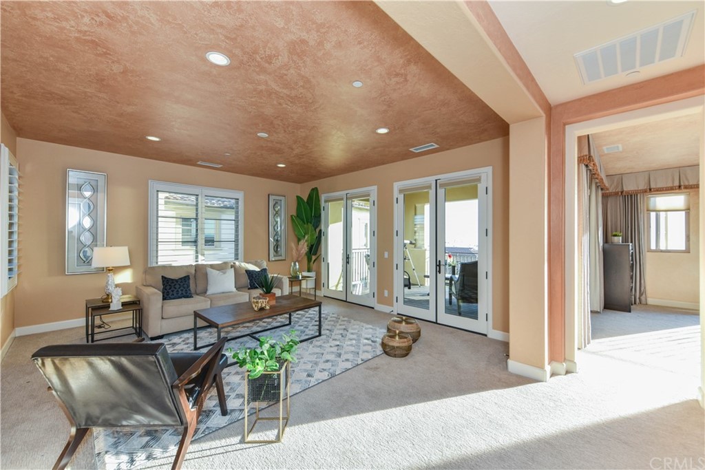 323 Via Pamplona San Clemente, CA 92672 - Photo 35 of 74 a living room with furniture and a large window