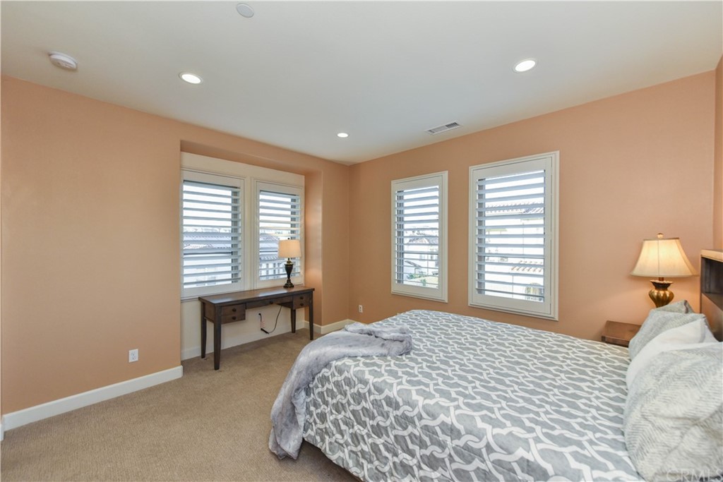 323 Via Pamplona San Clemente, CA 92672 - Photo 47 of 74 a bedroom with a bed and a window