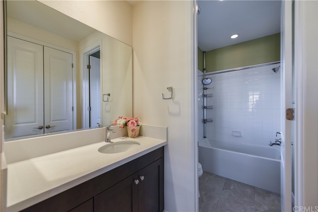 323 Via Pamplona San Clemente, CA 92672 - Photo 48 of 74 a bathroom with a tub sink and mirror