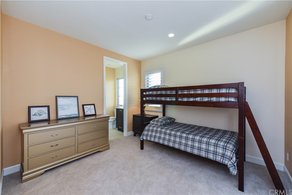 323 Via Pamplona San Clemente, CA 92672 - Photo 49 of 74 a bedroom with a bed and a dresser