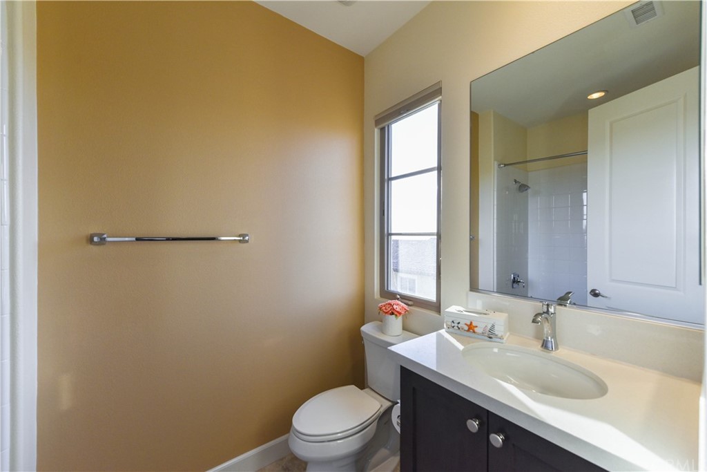 323 Via Pamplona San Clemente, CA 92672 - Photo 51 of 74 a bathroom with a sink toilet and vanity