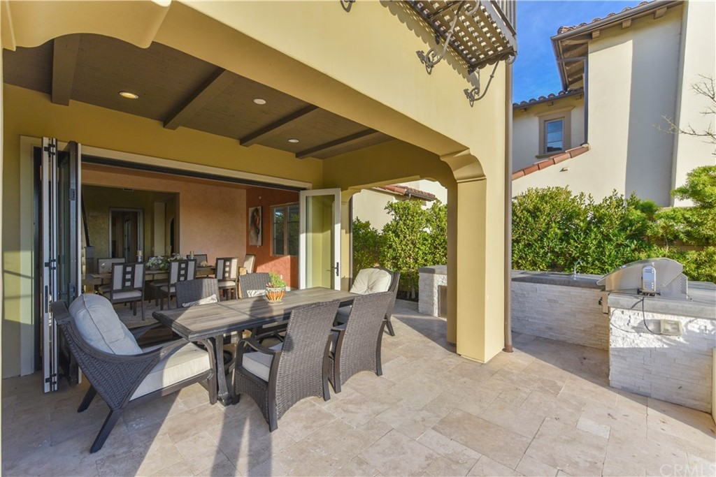 323 Via Pamplona San Clemente, CA 92672 - Photo 54 of 74 a dining room with furniture and a potted plant