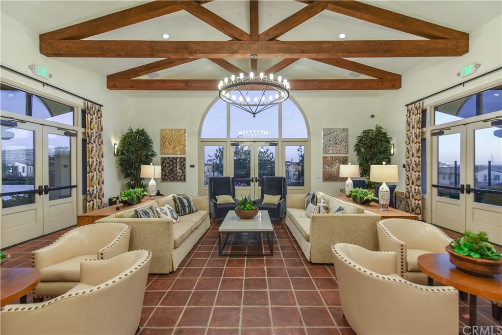 323 Via Pamplona San Clemente, CA 92672 - Photo 62 of 74 a living room with furniture a chandelier and a large window