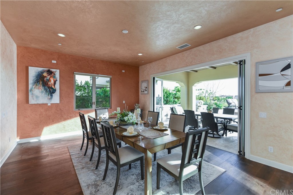 323 Via Pamplona San Clemente, CA 92672 - Photo 10 of 74 a view of a dining room with furniture window and wooden floor