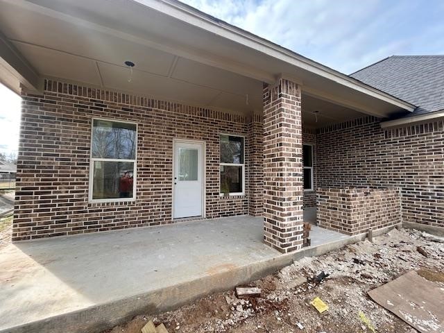 9204 Riggs Street Beaumont, TX 77707 - Photo 16 of 20 a view of a porch