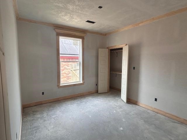 9204 Riggs Street Beaumont, TX 77707 - Photo 8 of 20 a view of an empty room with a window