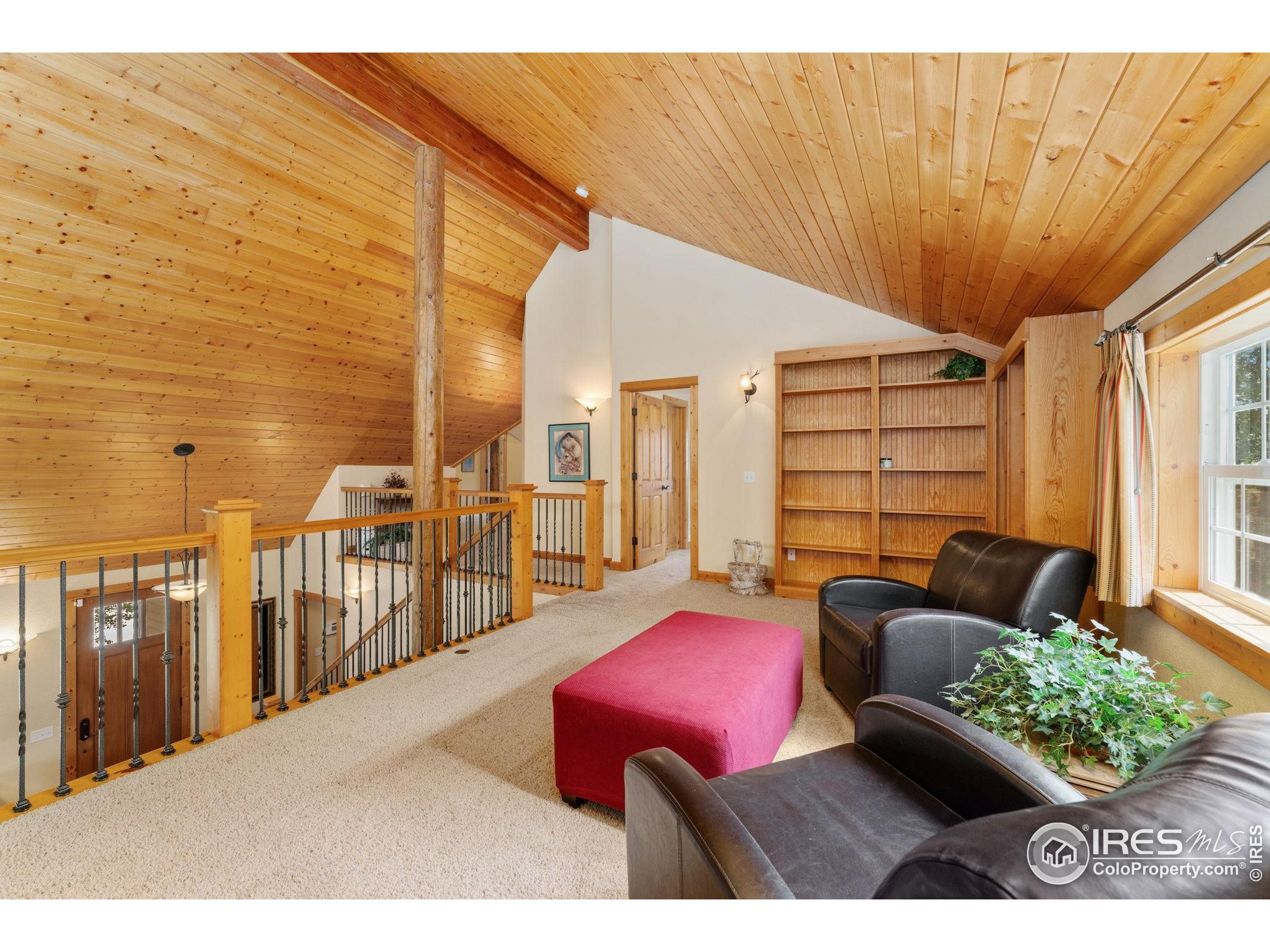 3302 Rinn Valley Drive Longmont, CO 80504 - Photo 23 of 45 a living room with furniture