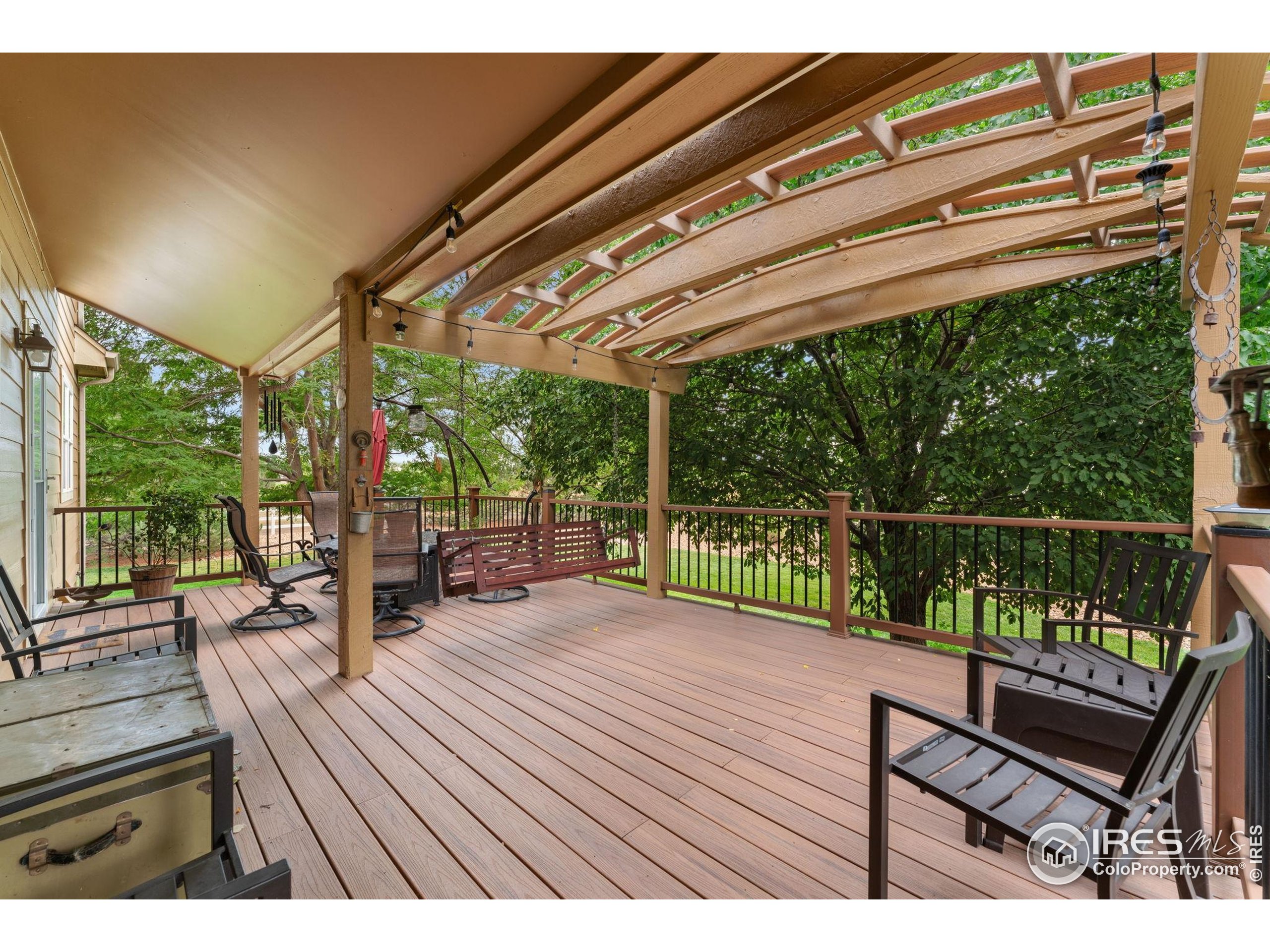 3302 Rinn Valley Drive Longmont, CO 80504 - Photo 35 of 45 a view of a chairs and tables in the balcony