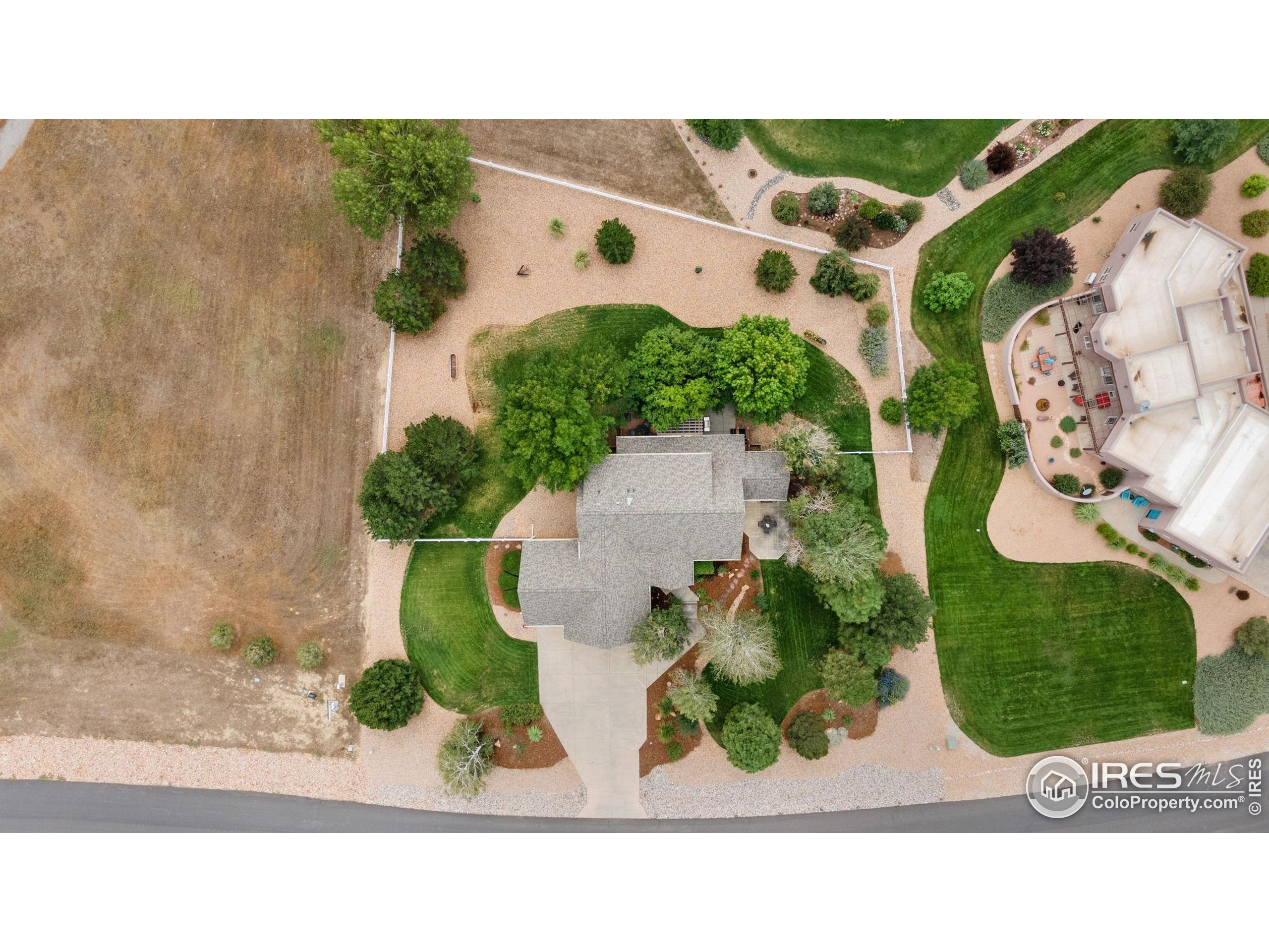 3302 Rinn Valley Drive Longmont, CO 80504 - Photo 42 of 45 a black and white photo of a house