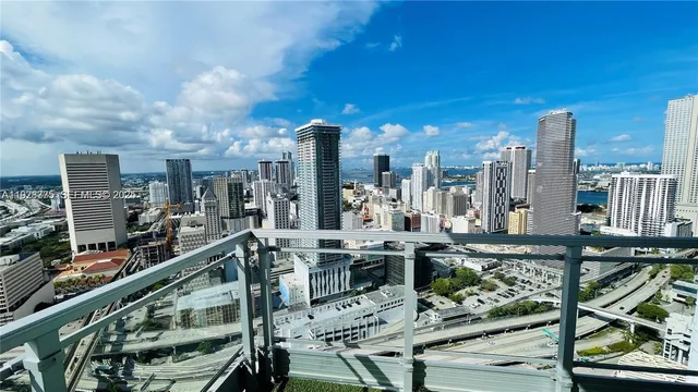 a view of a chairs and table in a patio