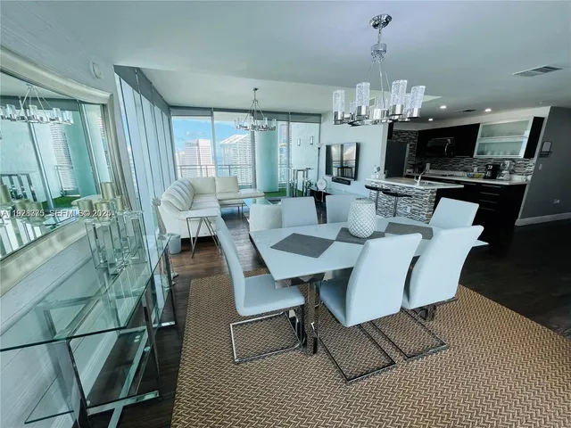 a view of a dining room with furniture