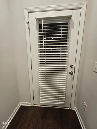 a view of wooden floor in a bathroom