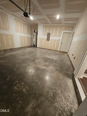 a view of swimming pool in front of residential houses with outdoor space