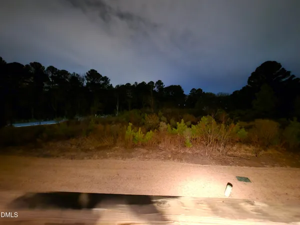 a room with furniture pool table and flat screen tv