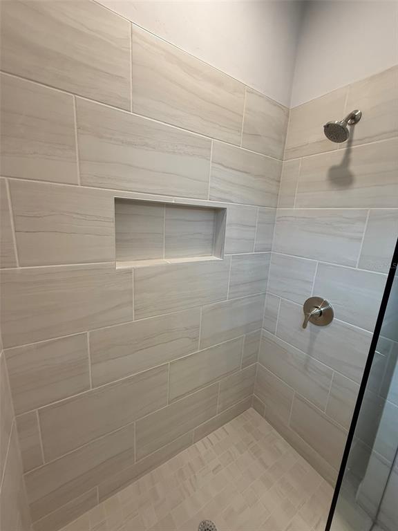 9654 Southwest 67th Lane Gainesville, FL 32608 - Photo 15 of 44 a bathroom with a shower