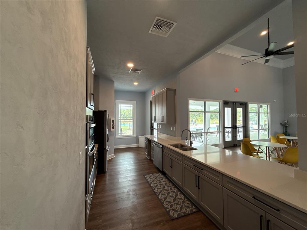 9654 Southwest 67th Lane Gainesville, FL 32608 - Photo 29 of 44 a lobby with furniture and floor to ceiling window