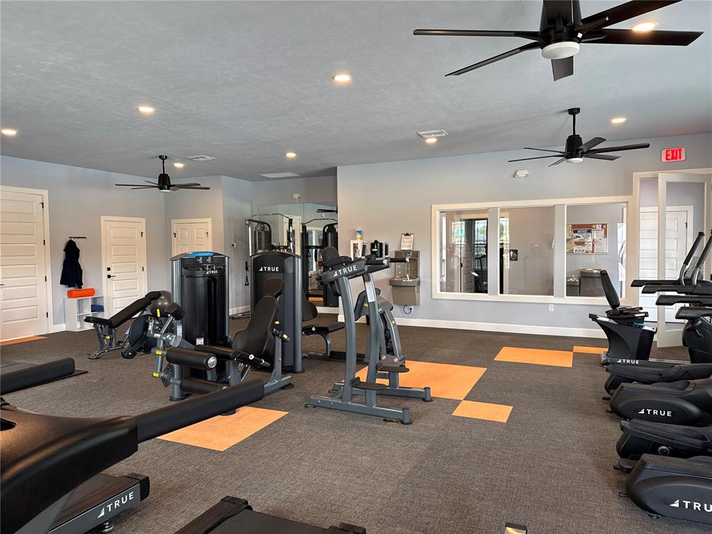 9654 Southwest 67th Lane Gainesville, FL 32608 - Photo 40 of 44 a view of a room with gym equipment