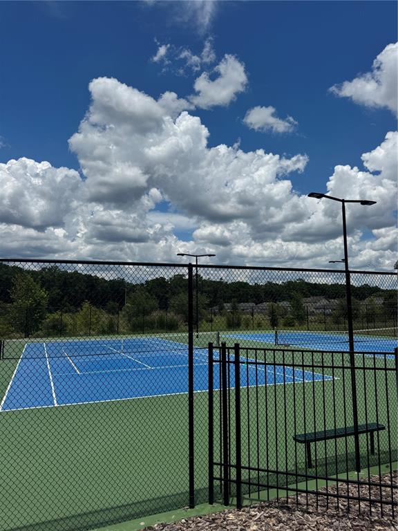 9654 Southwest 67th Lane Gainesville, FL 32608 - Photo 42 of 44 a view of a tennis court