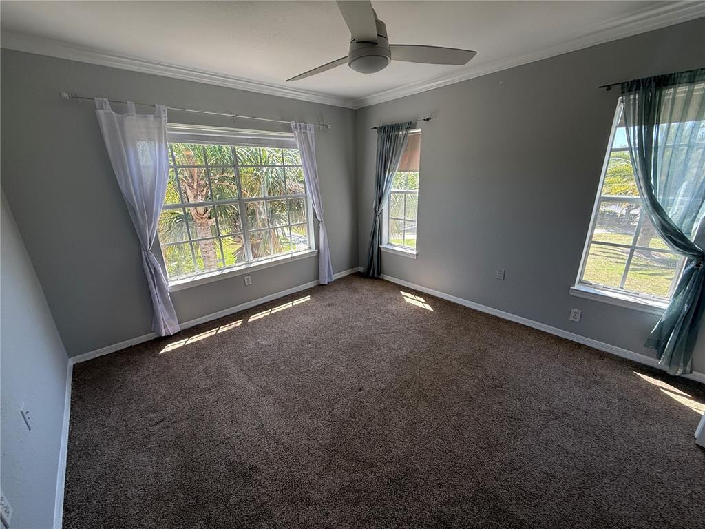 8932 Manor Loop, Unit 205 Lakewood Ranch, FL 34202 - Photo 9 of 15 a view of an empty room with a window