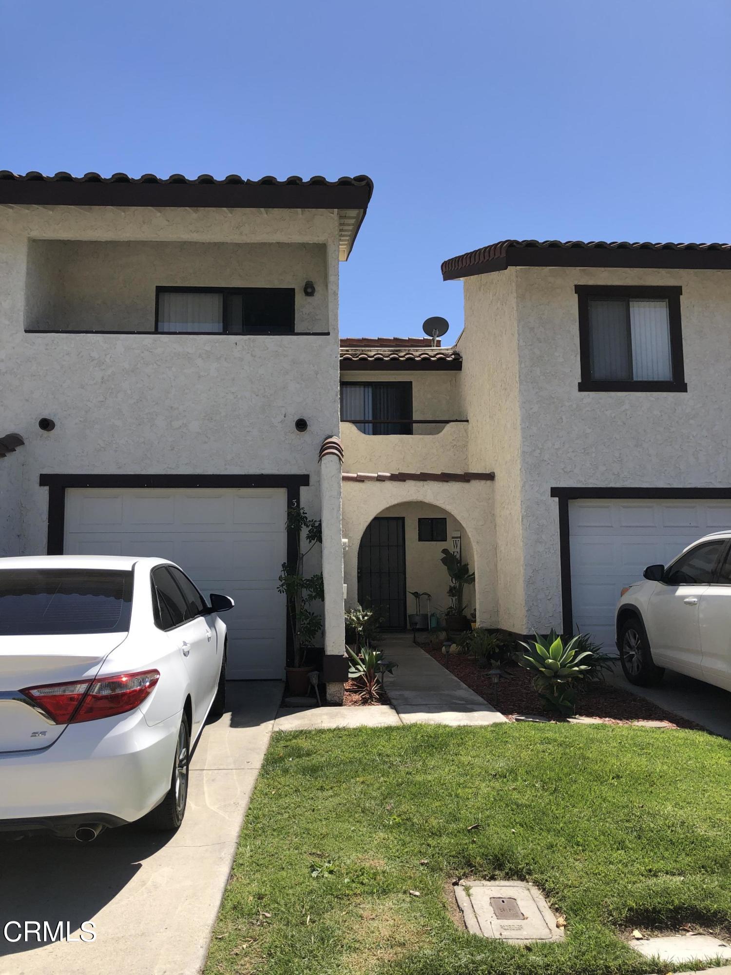 352 East Bard Road Oxnard, CA 93033 - Photo 1 of 26 a view of a yard with a patio