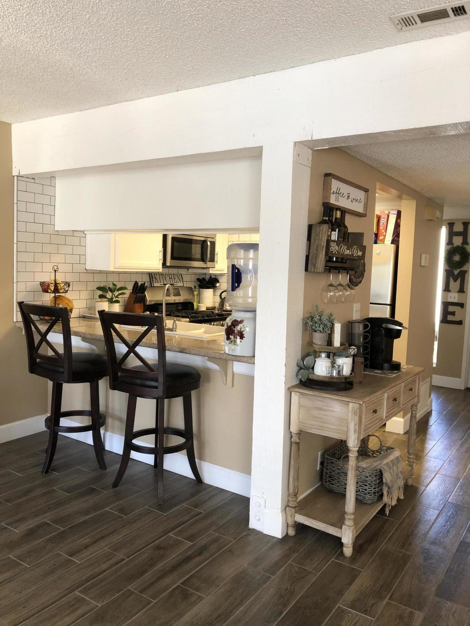 352 East Bard Road Oxnard, CA 93033 - Photo 12 of 26 a view of a dining room with furniture and wooden floor