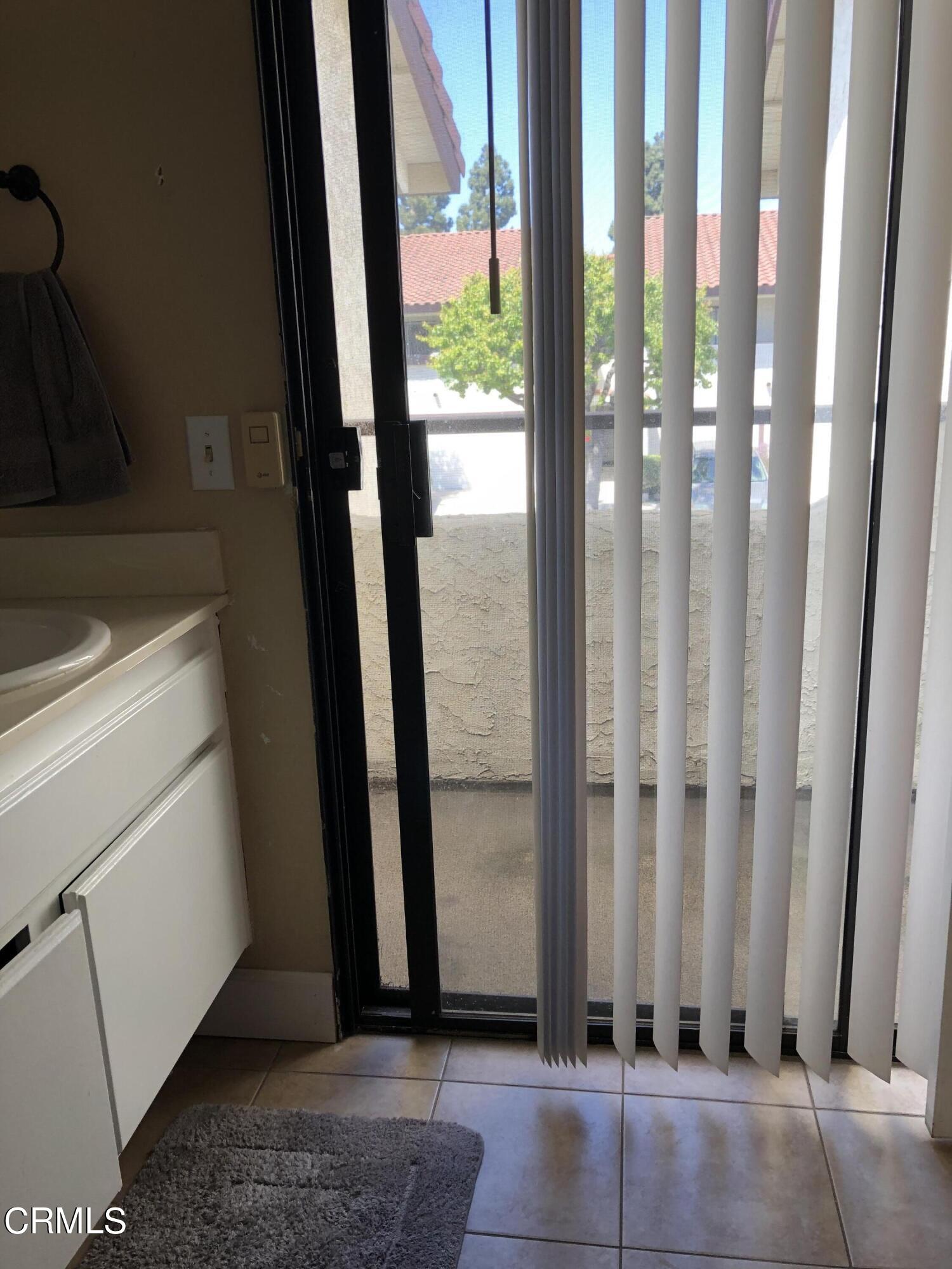 352 East Bard Road Oxnard, CA 93033 - Photo 20 of 26 a view of a door with a sink