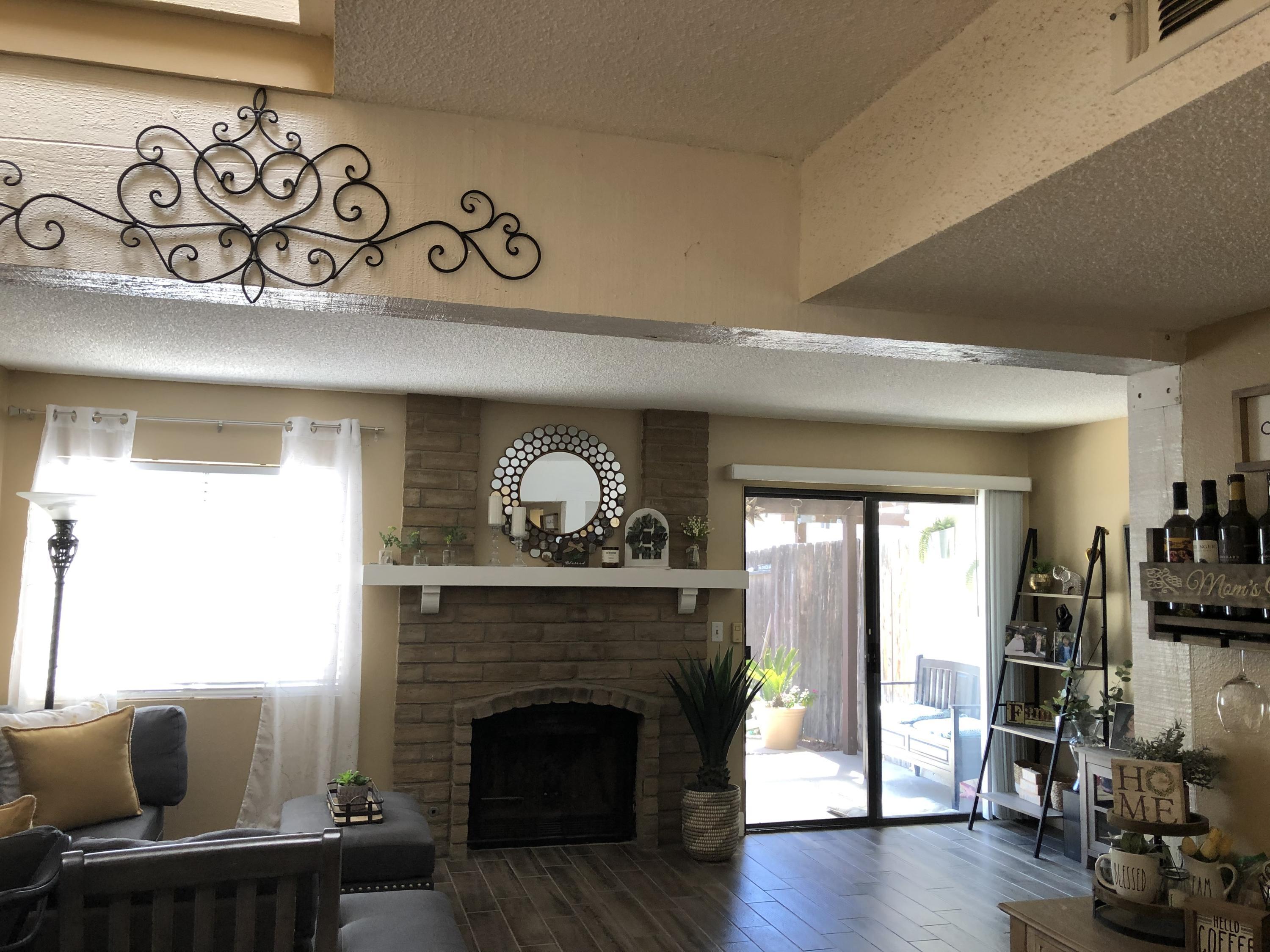 352 East Bard Road Oxnard, CA 93033 - Photo 8 of 26 a living room with furniture and a fireplace