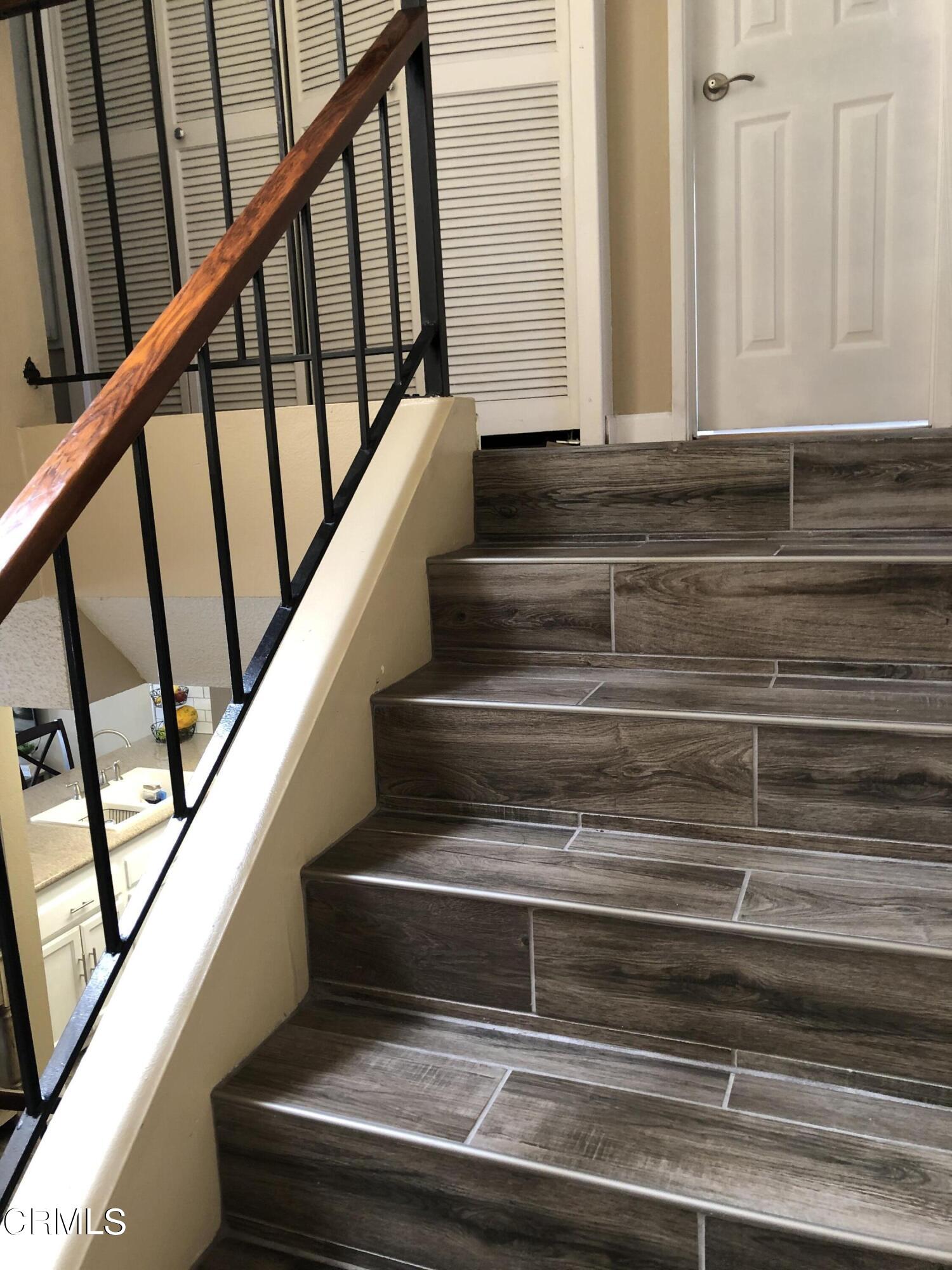 352 East Bard Road Oxnard, CA 93033 - Photo 9 of 26 a view of staircase with white walls and a window