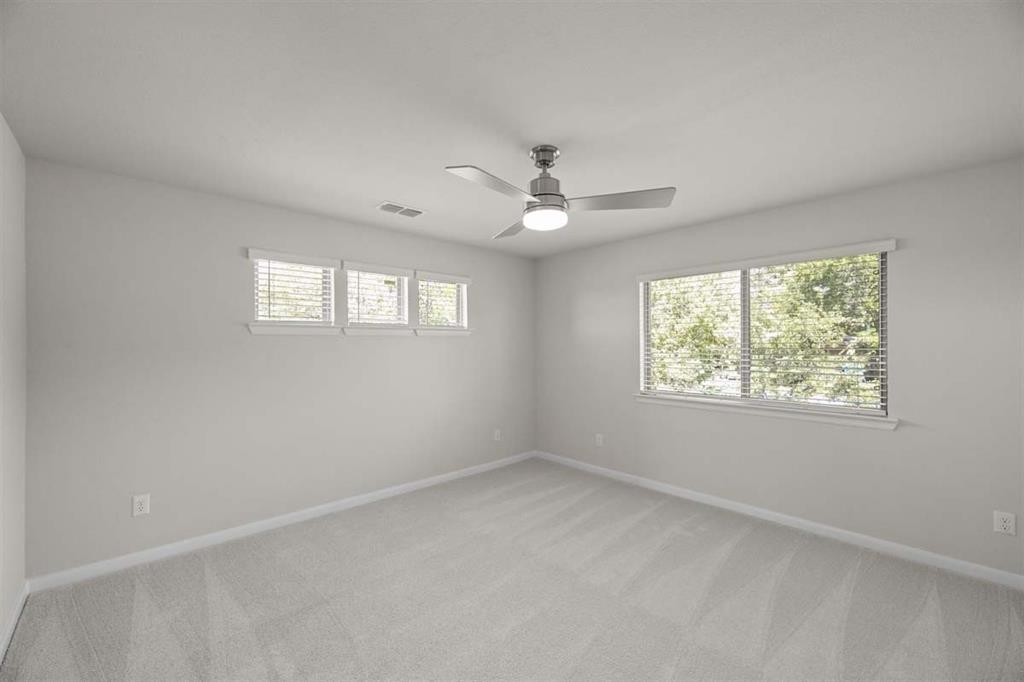 203 Griffith Drive Princeton, TX 75407 - Photo 7 of 15 a view of an empty room with a window