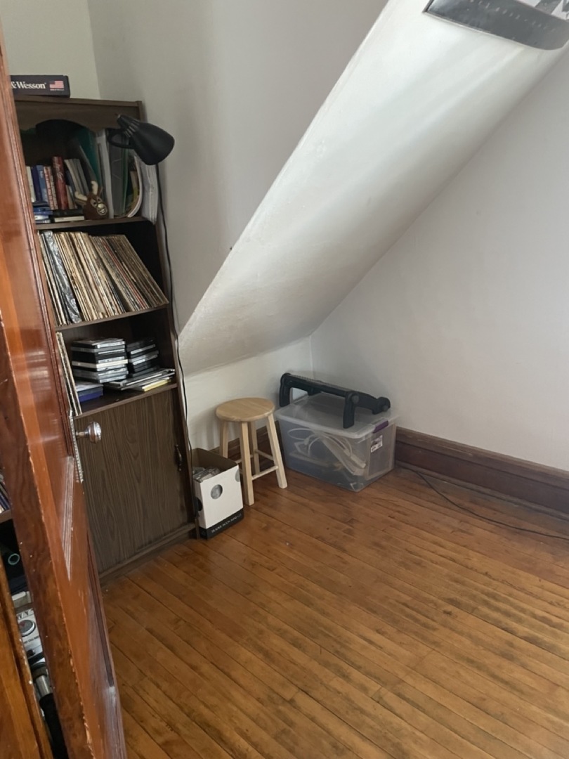 4555 South Francisco Avenue Chicago, IL 60632 - Photo 16 of 40 a view of a room with wooden floor