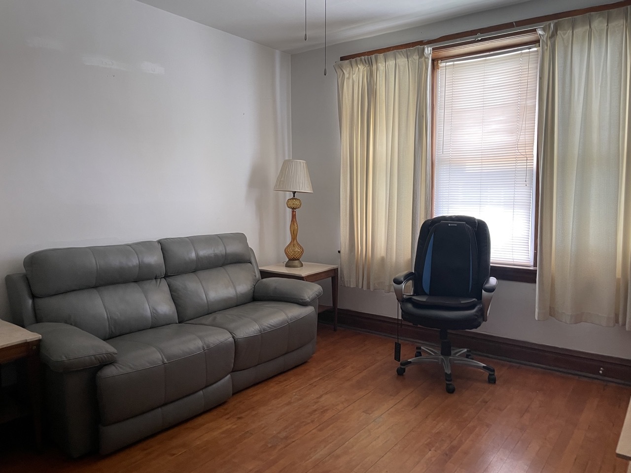 4555 South Francisco Avenue Chicago, IL 60632 - Photo 22 of 40 a living room with furniture and a window