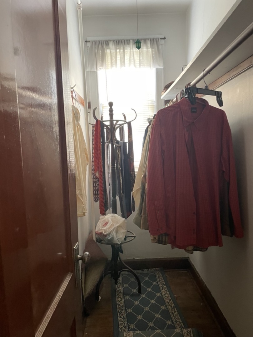 4555 South Francisco Avenue Chicago, IL 60632 - Photo 32 of 40 a view of a room with furniture and a window