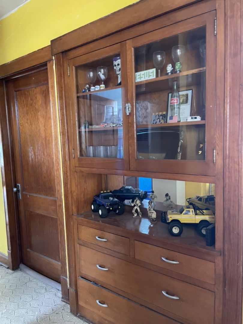 4555 South Francisco Avenue Chicago, IL 60632 - Photo 39 of 40 a table with wooden floor and shelf